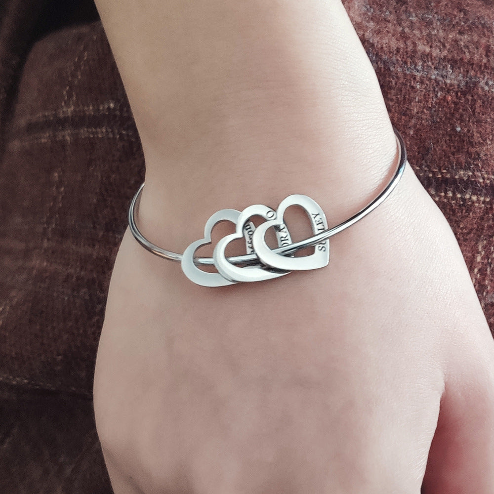 Titanium Steel Hollow Heart Charm Bracelet