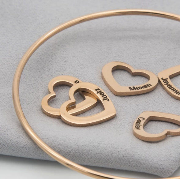 Titanium Steel Hollow Heart Charm Bracelet